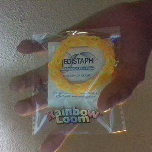 orange and white rainbow loom bracelet